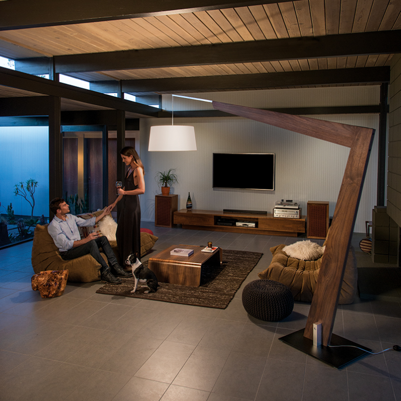 The Valeo Floor Lamp from Cerno in dark stained walnut in a family space.