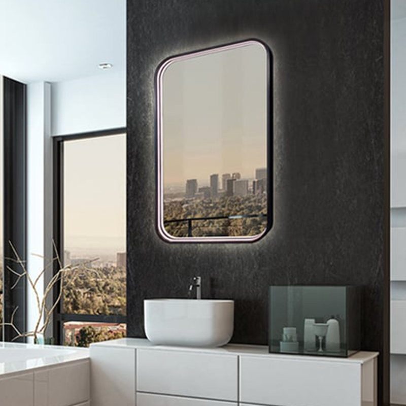 The Eminence Lighted Mirror from Electric Mirror in a dressing area.