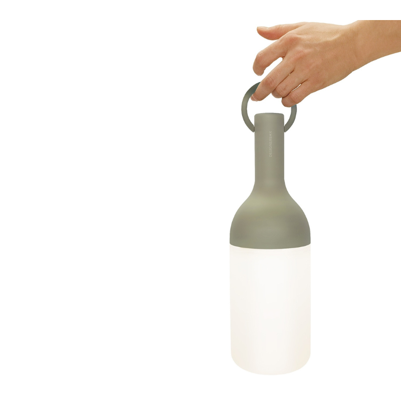 The ELO Portable Table Lamp by Bina Baitel for DesignerBox in khaki handheld.
