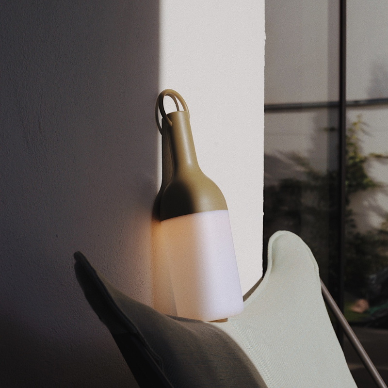 The ELO Portable Table Lamp by Bina Baitel for DesignerBox in a living room.