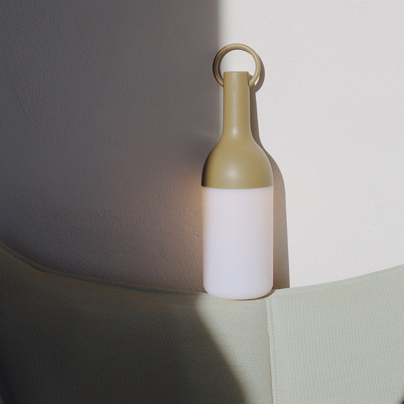 The ELO Portable Table Lamp by Bina Baitel for DesignerBox in a lounge.