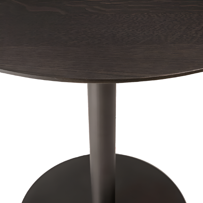 The Blend Dining Table from Ethnicraft in brown oak in detail.