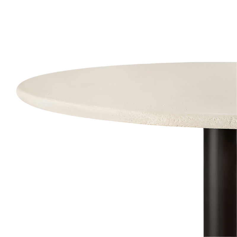 The Blend Dining Table from Ethnicraft tabletop in microcement.