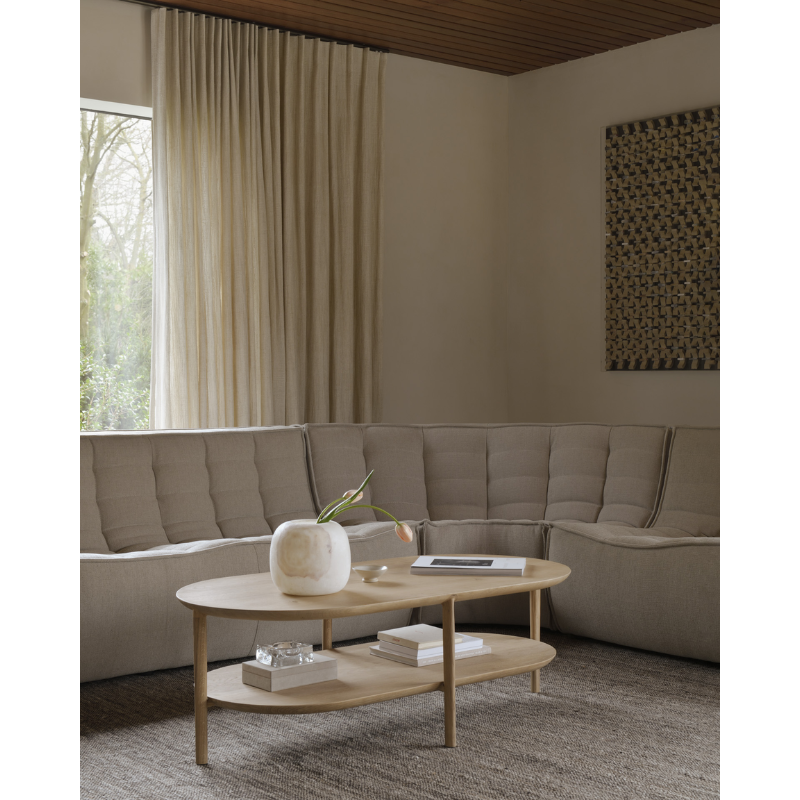 The Bok Coffee Table from Ethnicraft in a living room.