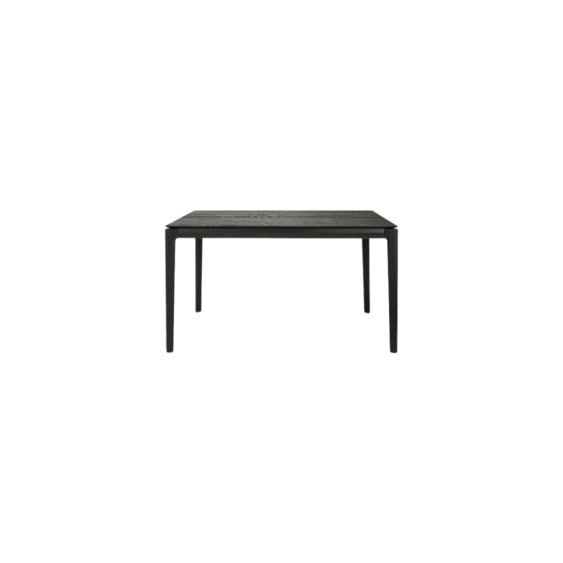 The 55 to 87 inch Bok Extendable Dining Table from Ethnicraft in black oak.