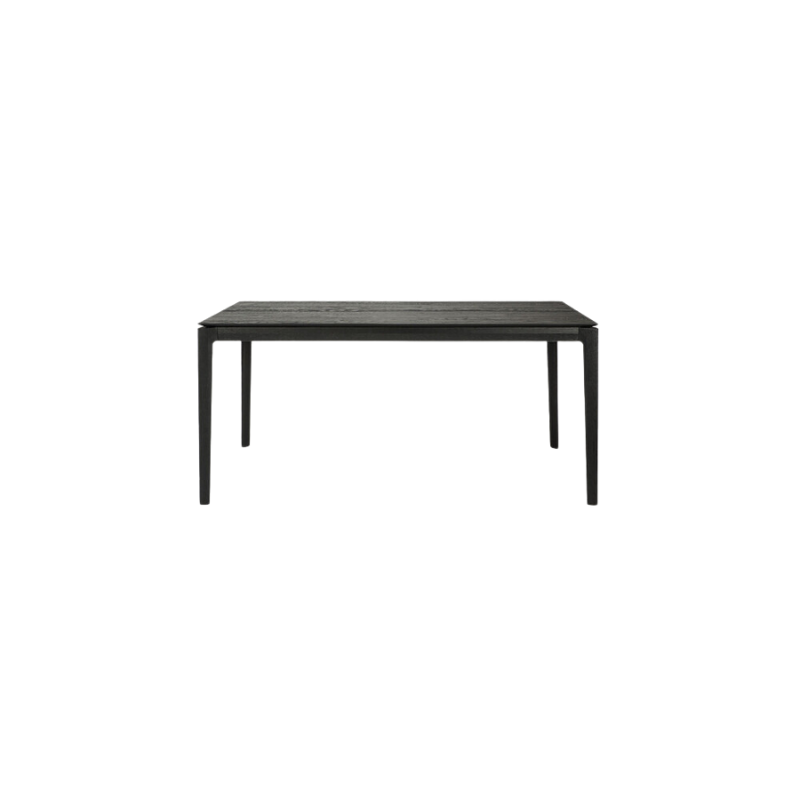 The 63 to 96 inch Bok Extendable Dining Table from Ethnicraft in black oak.