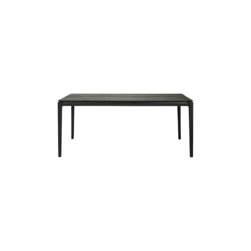 The 71 to 110 inch Bok Extendable Dining Table from Ethnicraft in black oak.