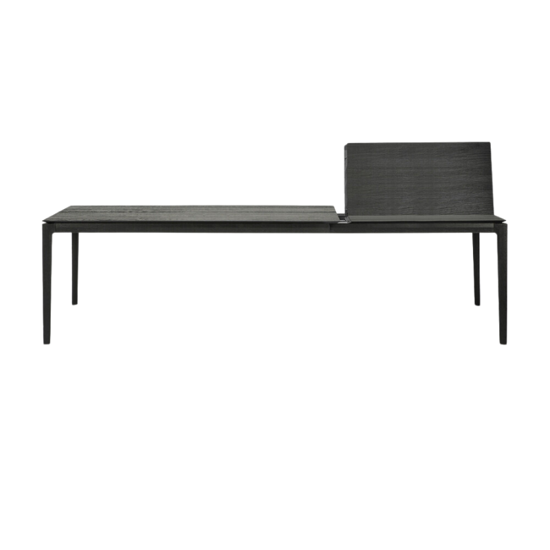 The 79 to 118 inch Bok Extendable Dining Table from Ethnicraft in black oak collapsing.