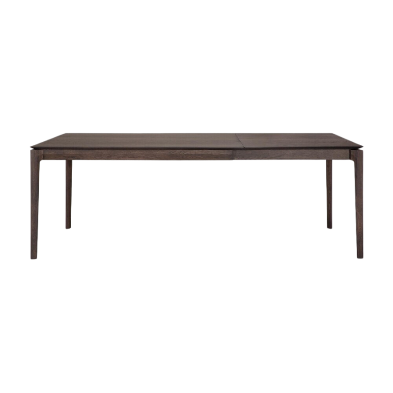 The 55 to 87 inch Bok Extendable Dining Table from Ethnicraft in brown oak extended.