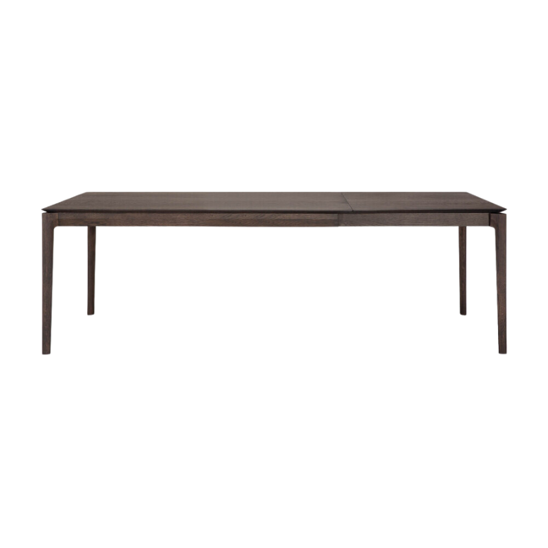 The 63 to 96 inch Bok Extendable Dining Table from Ethnicraft in brown oak extended.