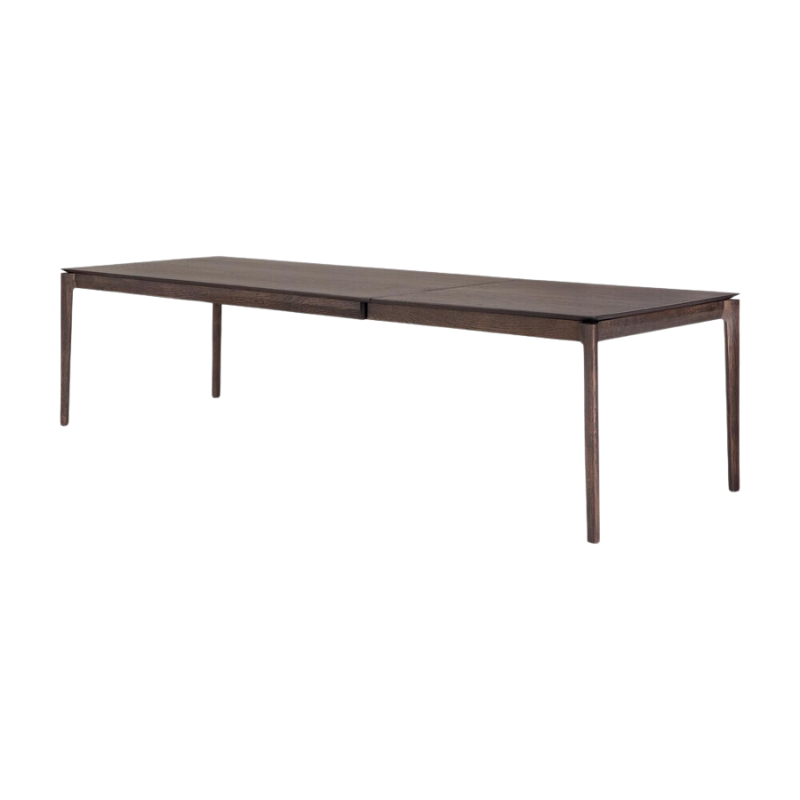 The 79 to 118 inch Bok Extendable Dining Table from Ethnicraft in brown oak extended from an angle.