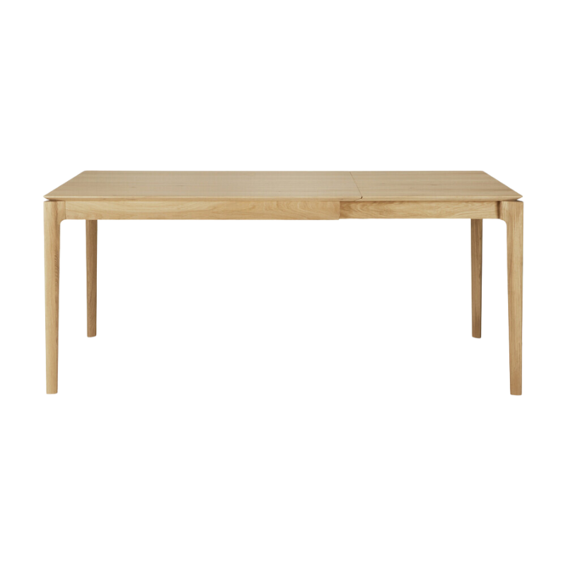 The 47 to 71 inch Bok Extendable Dining Table from Ethnicraft in oak extended.