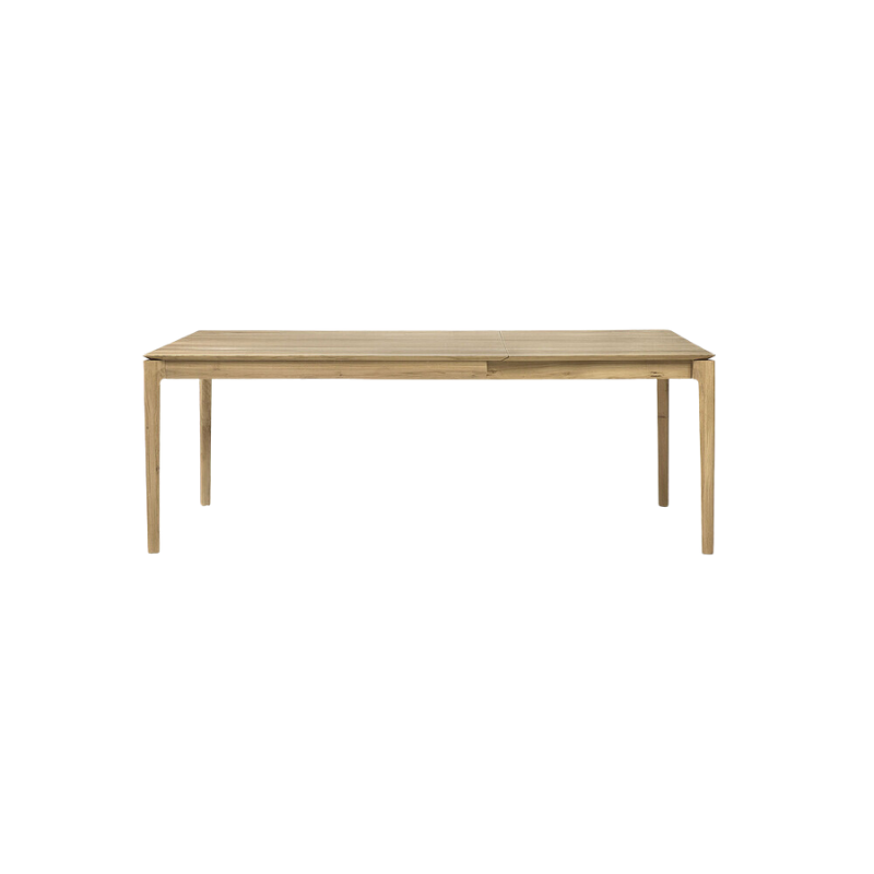The 55 to 87-inch Bok Extendable Dining Table from Ethnicraft in oak extended.