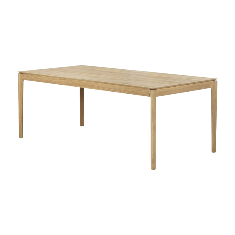 The 79 to 118 inch Bok Extendable Dining Table from Ethnicraft in oak from an angle.