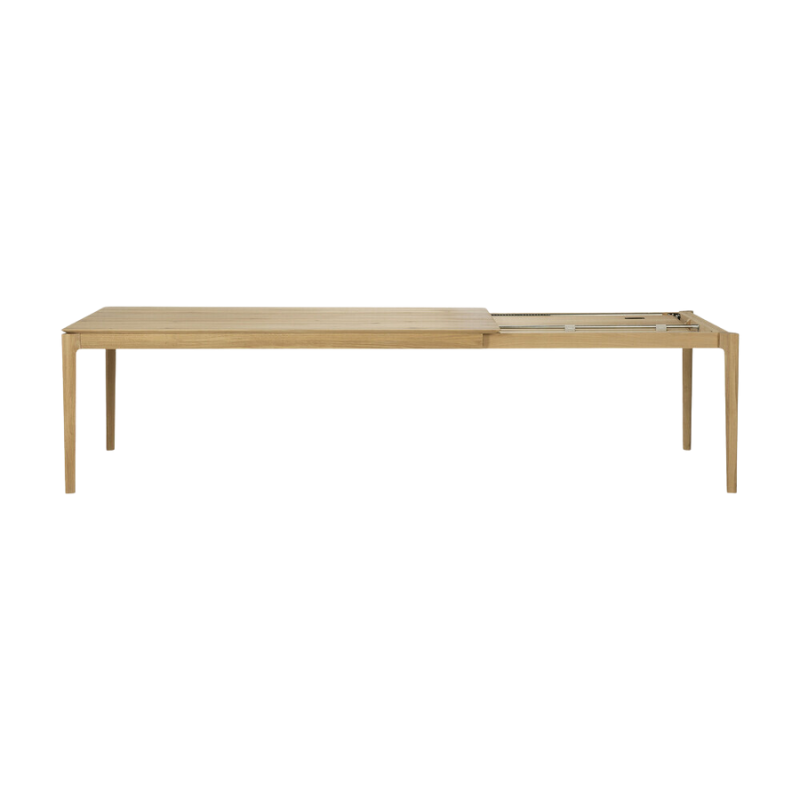 The 79 to 118 inch Bok Extendable Dining Table from Ethnicraft in oak collapsed.