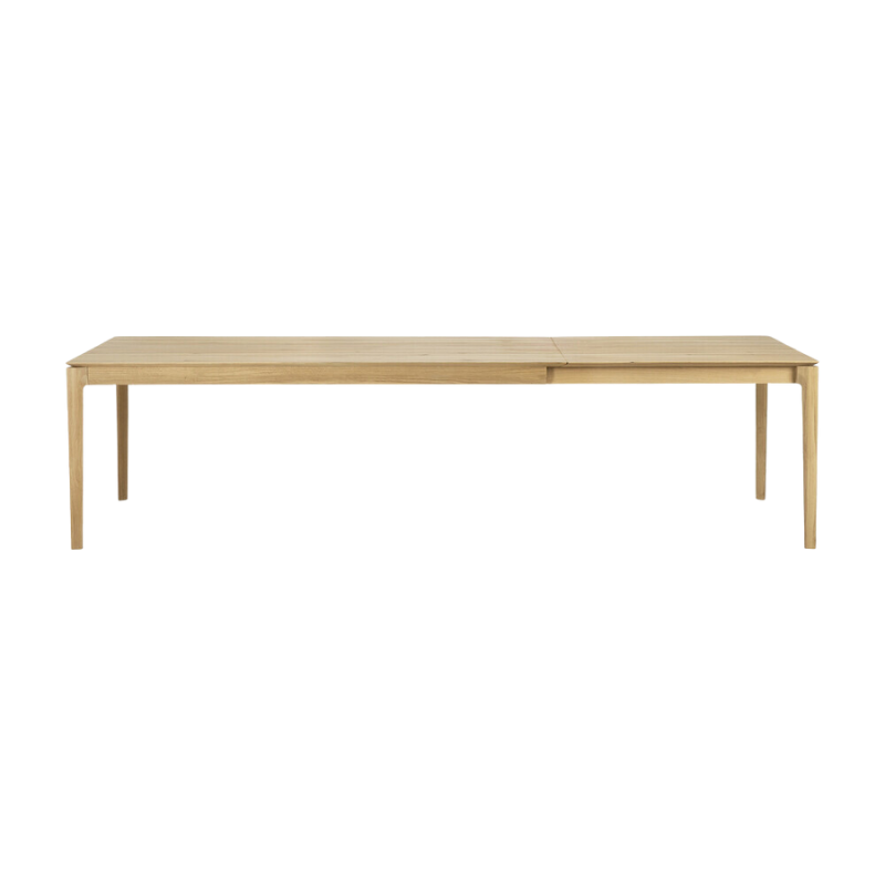 The 79 to 118 inch Bok Extendable Dining Table from Ethnicraft in oak extended.
