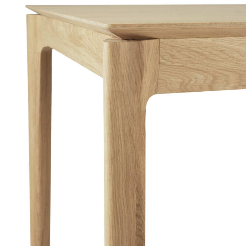 The Bok Extendable Dining Table from Ethnicraft in oak corner.