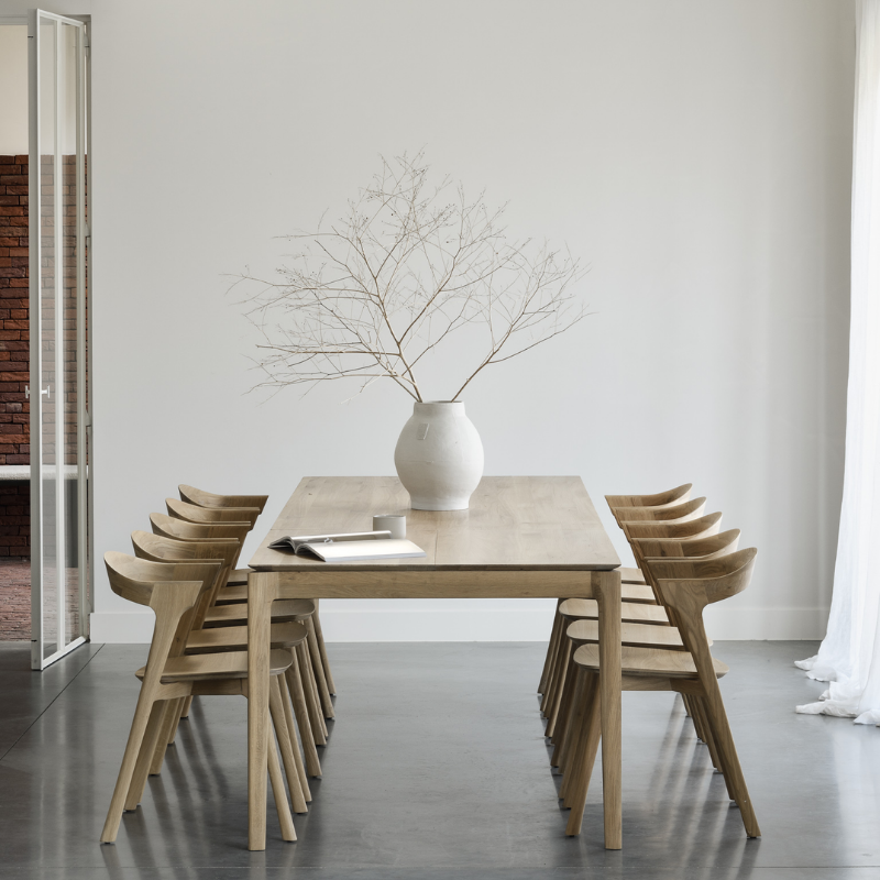 The Bok Extendable Dining Table from Ethnicraft in oak in a living space.