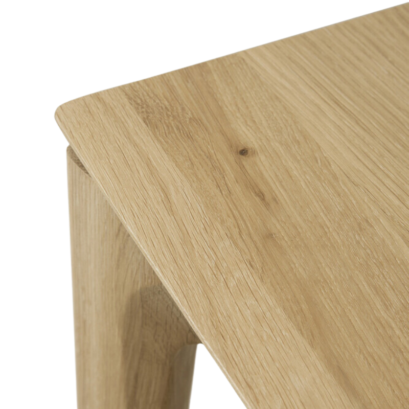 The Bok Extendable Dining Table from Ethnicraft in oak table top.