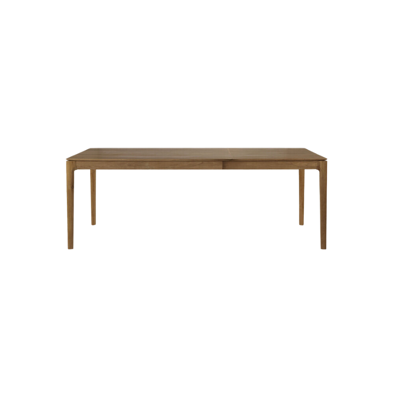 The 55 to 87 inch Bok Extendable Dining Table from Ethnicraft in teak extended.