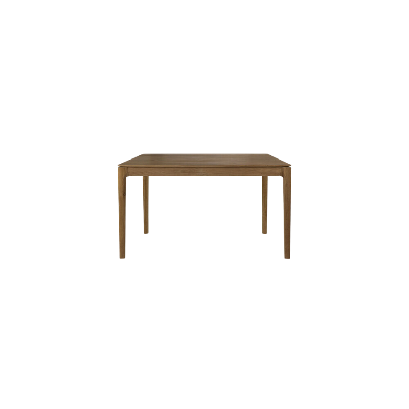 The 55 to 87 inch Bok Extendable Dining Table from Ethnicraft in teak.