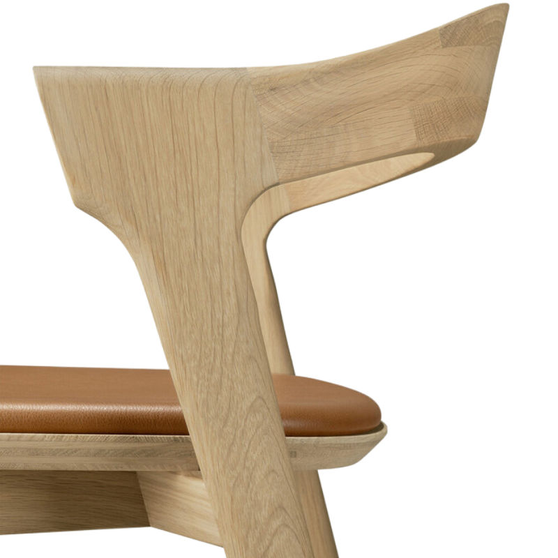 The Bok Upholstered Bar Stool by Ethnicraft backrest close-up from the side angle.