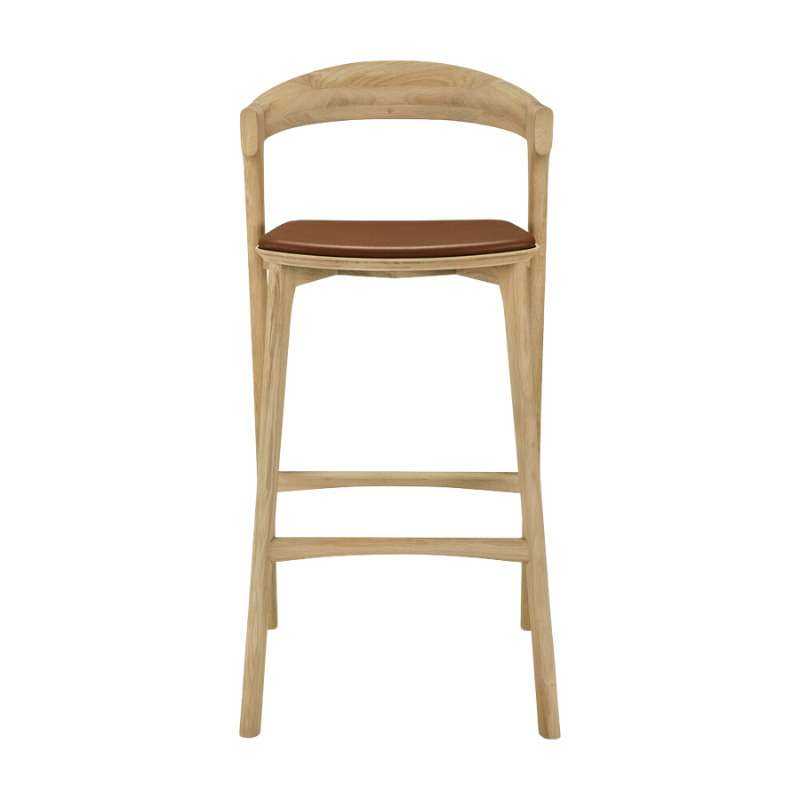 The Bok Upholstered Bar Stool by Ethnicraft from the front.