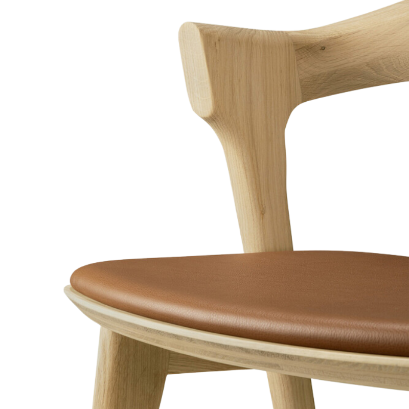 The Bok Upholstered Counter Stool from Ethnicraft focuses on the seat.