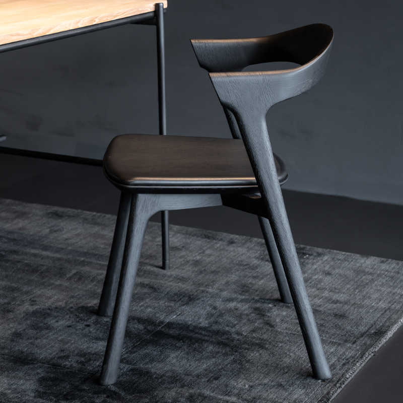 The Bok Upholstered Dining Chair from Ethnicraft in a family area.