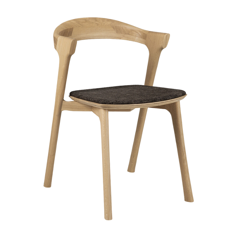 The Bok Upholstered Dining Chair from Ethnicraft in oak with dark brown fabric.