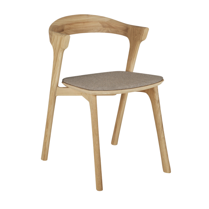 The Bok Upholstered Dining Chair from Ethnicraft in oak with warm grey fabric.