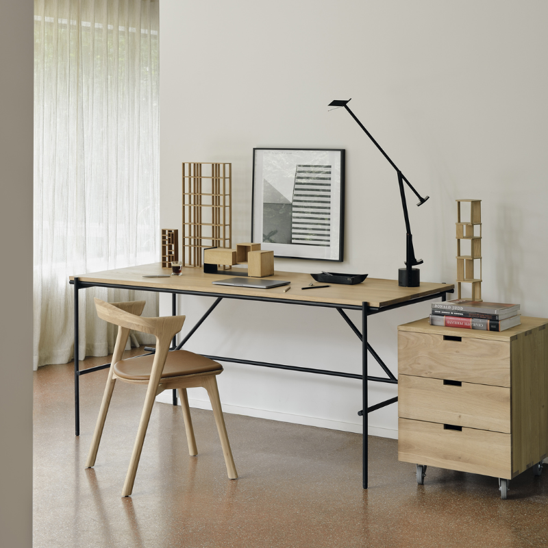 The Bok Upholstered Dining Chair from Ethnicraft in an office.