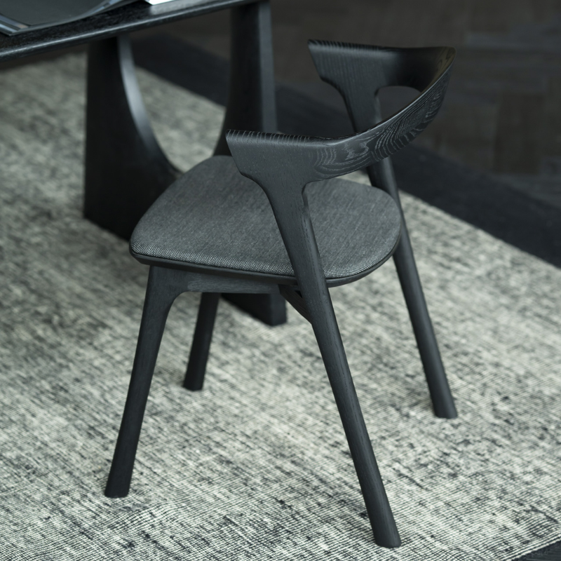 The Bok Upholstered Dining Chair from Ethnicraft in a residential setting.