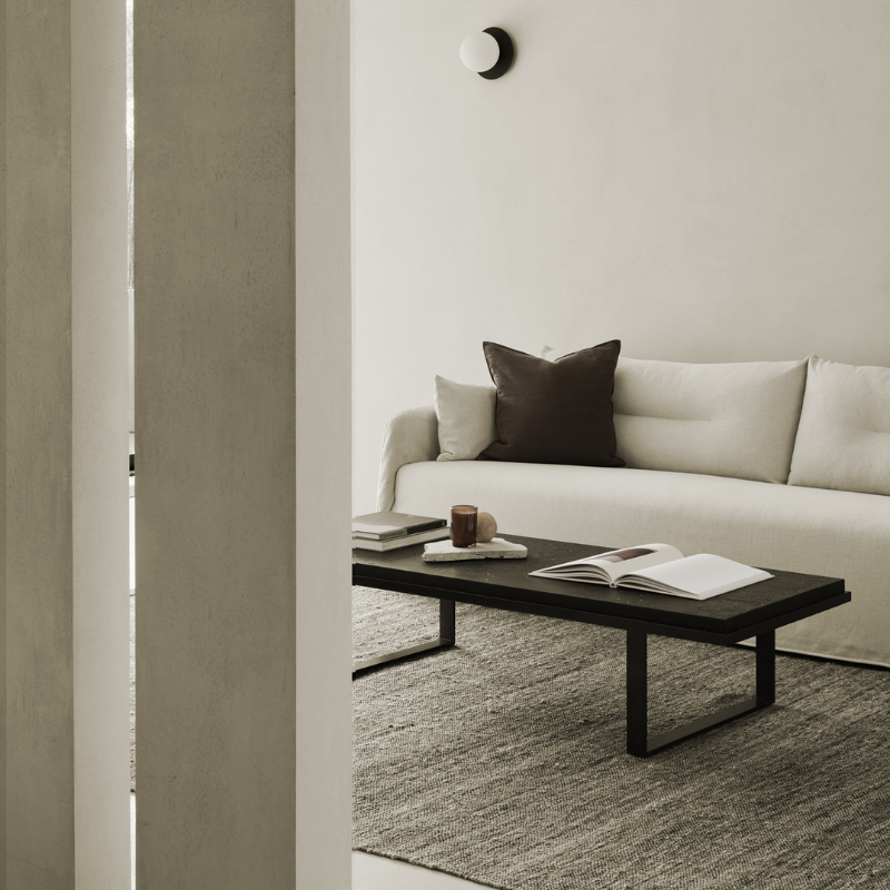 The bone Weave Sofa by Ethnicraft in a living room.