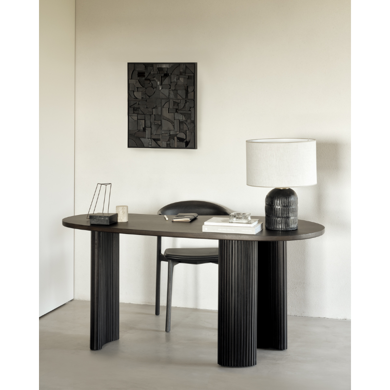 The Boomerang Desk from Ethnicraft in a home office.