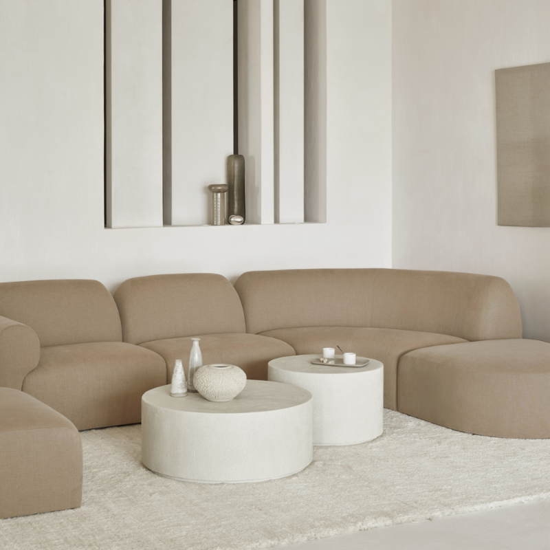 The Bulky Modular Sofa 90 Degrees Round Corner from Ethnicraft in a living room.
