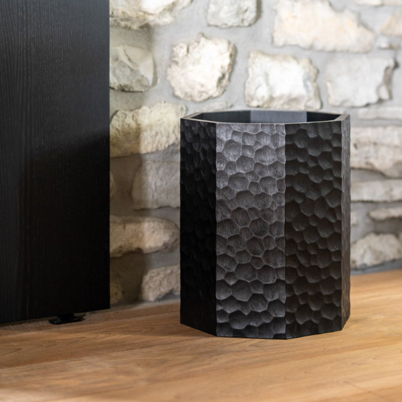 The Chopped Paper Basket from Ethnicraft in a study room.