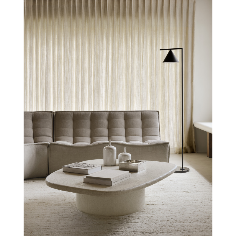 The Elements Coffee Table from Ethnicraft in a living room.