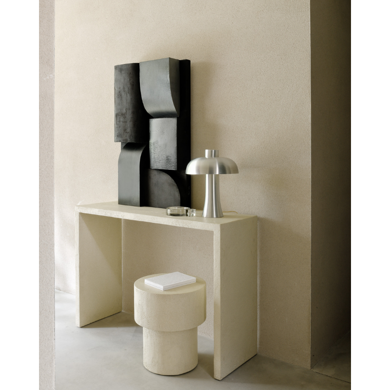 The Elements Mushroom Side Table from Ethnicraft in a family space.