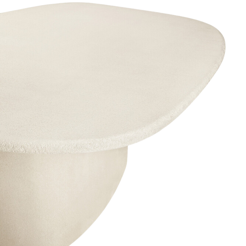 The Elements Pebble Dining Table by Ethnicraft from the edge close-up.