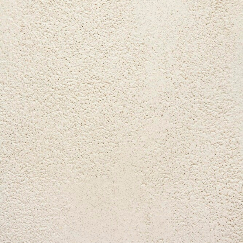 The Elements Round Dining Table from Ethnicraft texture of microcement.