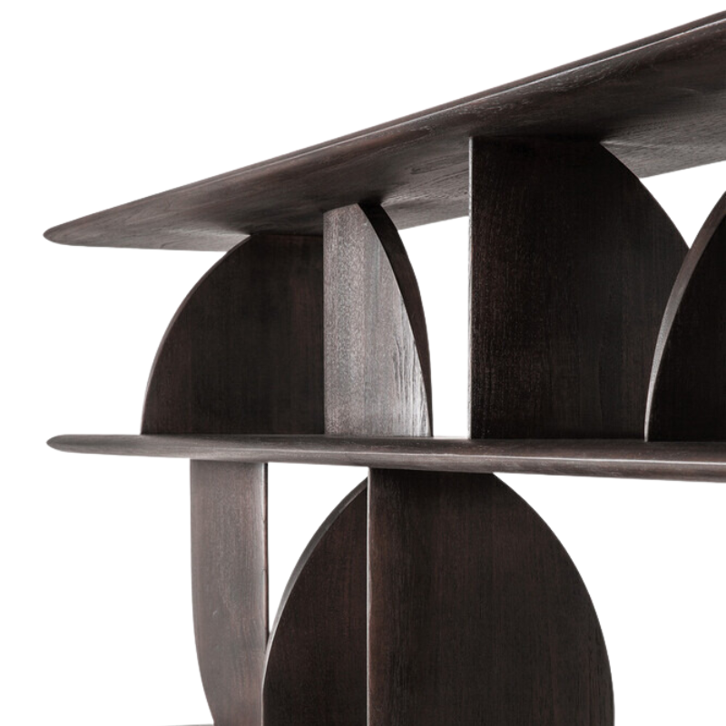 The Geometric Rack from Ethnicraft in dark brown teak corner.
