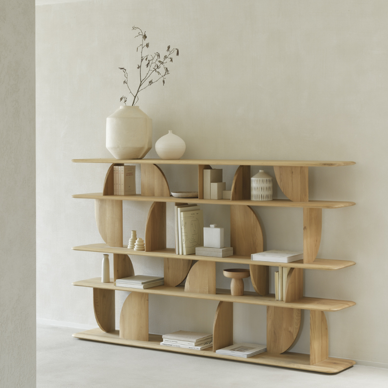 The Geometric Rack from Ethnicraft in oak within a lounge.