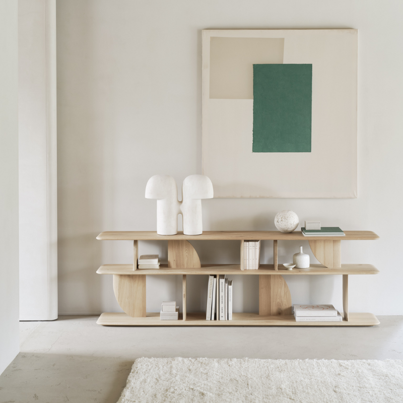 The Geometric Sofa Console from Ethnicraft in oak in a living room.