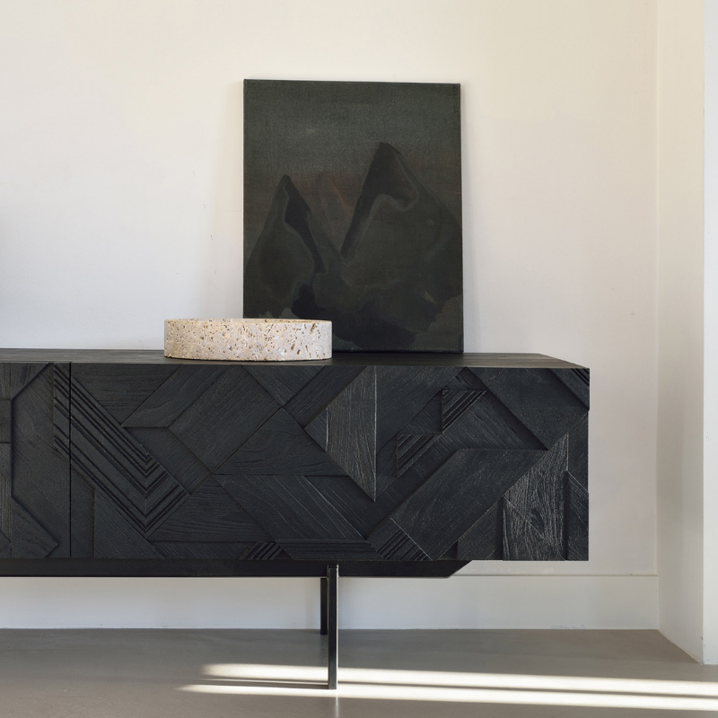 The Graphic TV Cupboard from Ethnicraft in a living room.