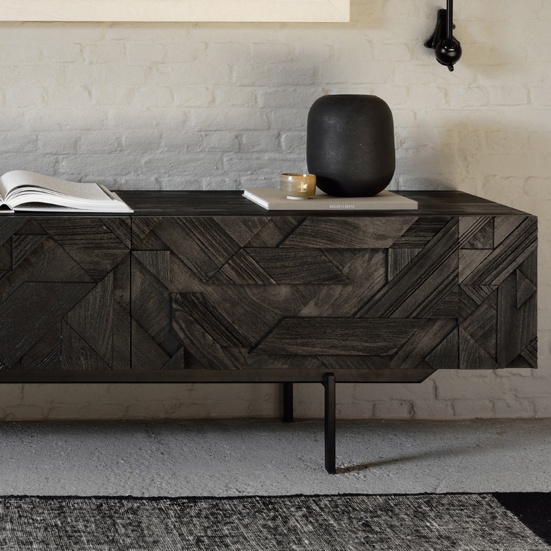 The Graphic TV Cupboard from Ethnicraft in a residential setting.