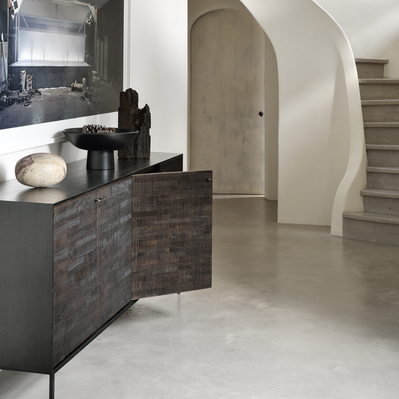 The Grooves Sideboard from Ethnicraft in a hallway.