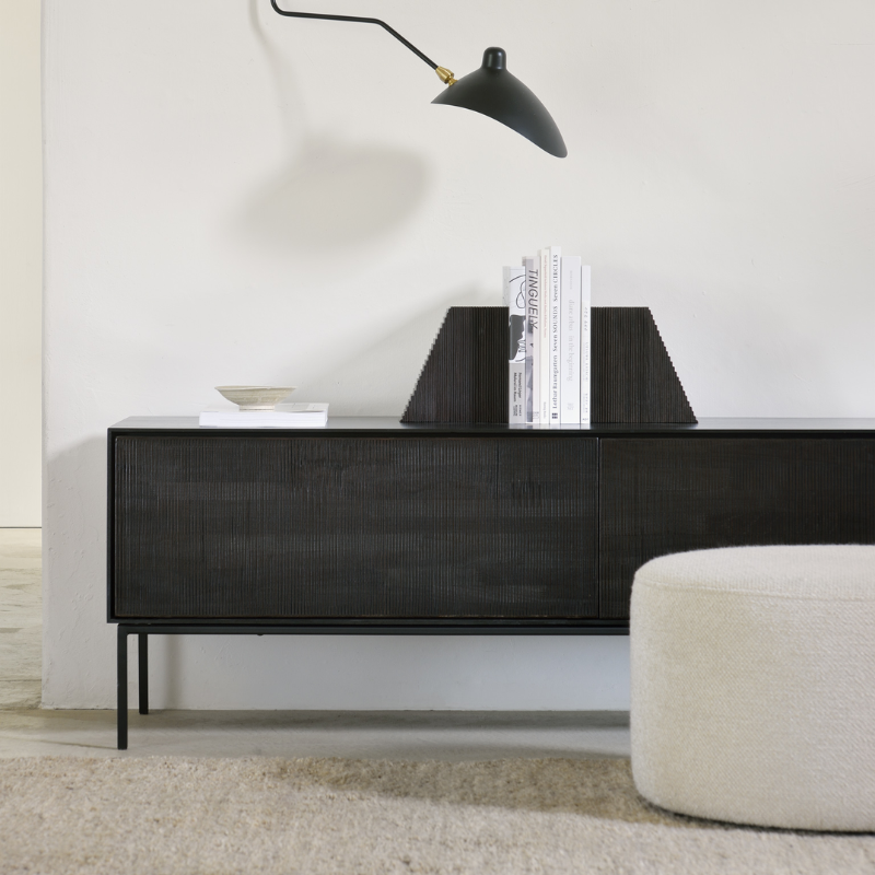 The Grooves TV Cupboard from Ethnicraft in a living room.