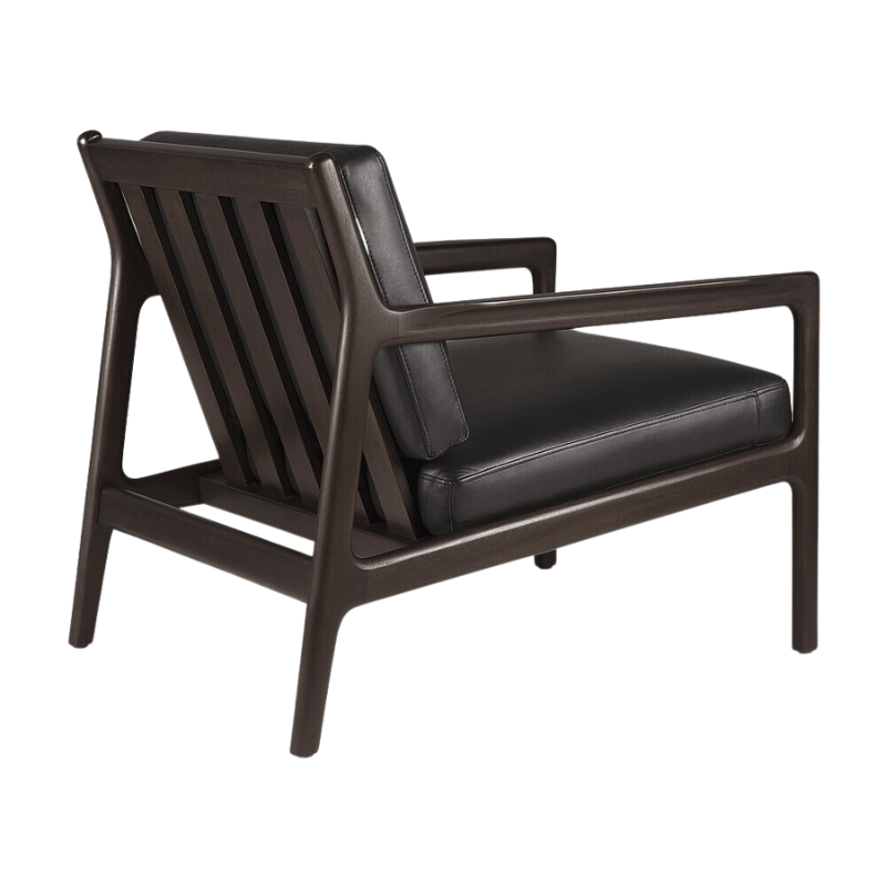 The Jack Lounge Chair from Ethnicraft with a black leather cushion from the back.
