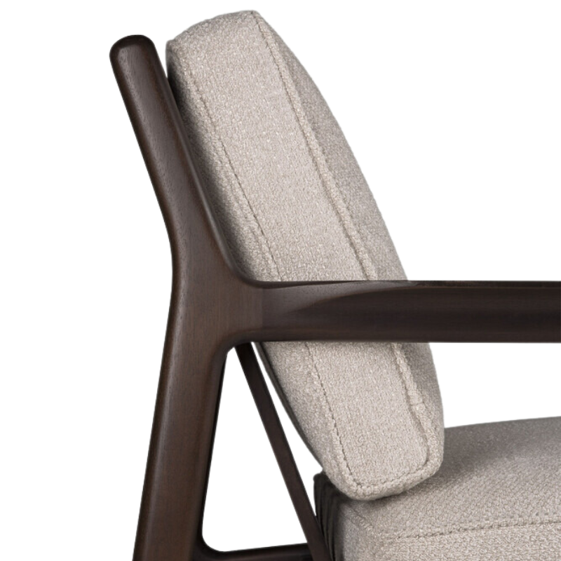 The Jack Lounge Chair from Ethnicraft with an ivory cushion highlighting the back rest.